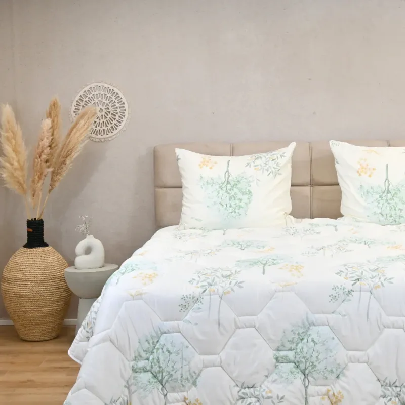 Elegant bedroom featuring HappyBed Fresh Forest satin-look duvet, perfect for year-round comfort.