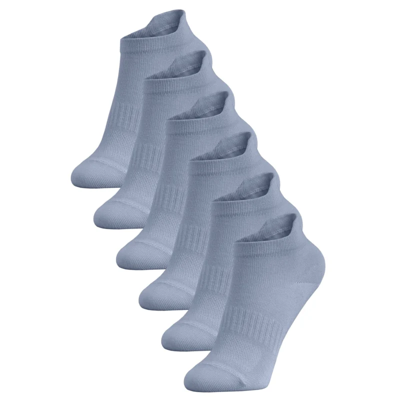 A six-pack of light blue kids' ankle socks arranged in a diagonal row against a white background.